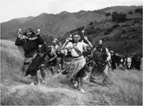 Unidentified Maori group with poi, performing at the unveiling of the Tasman Memorial at Tarakohe, during the Tasman tercentennial celebrations (1942) Photographer John Dorbee Pascoe. Courtesy Alexander Turnbull Library.